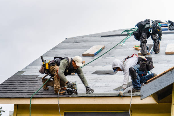 Professional Gutter Installation technician working in Bend, TX